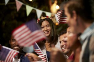 Friends Celebrating 4th Of July Holiday With Backyard Party